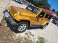 Front 3/4 View of 2014 Jeep Wrangler Unlimited Sahara 4x4 #4