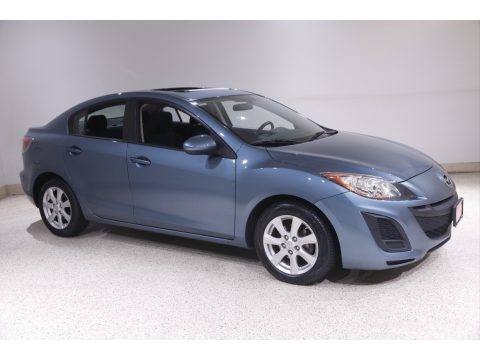 Gunmetal Blue Mica Mazda MAZDA3 i Touring 4 Door.  Click to enlarge.