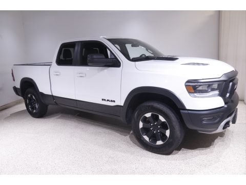 Bright White Ram 1500 Rebel Quad Cab 4x4.  Click to enlarge.