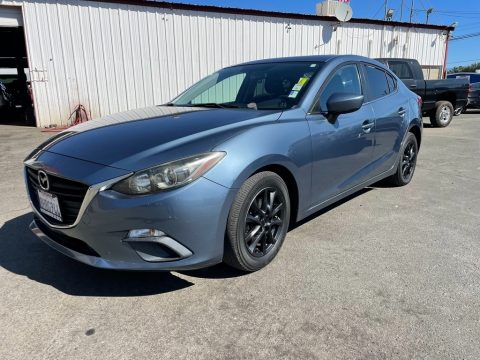 Blue Reflex Mica Mazda MAZDA3 i Touring 4 Door.  Click to enlarge.