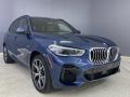 Front 3/4 View of 2023 BMW X5 xDrive45e #26