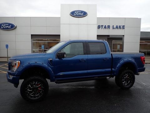 Atlas Blue Metallic Ford F150 Sherrod XLT SuperCrew 4x4.  Click to enlarge.