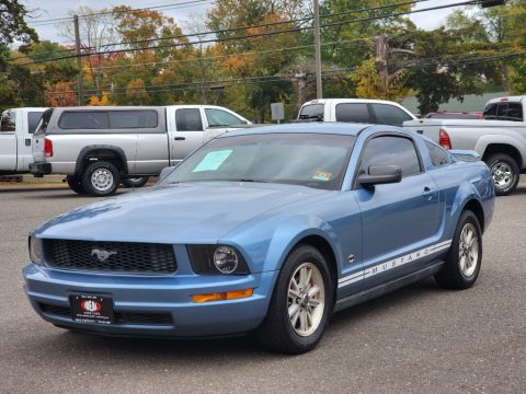 Vista Blue Metallic Ford Mustang V6 Deluxe Coupe.  Click to enlarge.