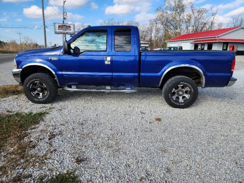 Sonic Blue Metallic Ford F250 Super Duty XLT SuperCab 4x4.  Click to enlarge.