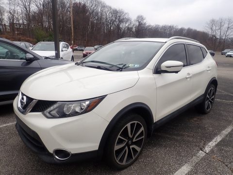 Pearl White Nissan Rogue Sport SL.  Click to enlarge.