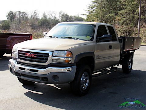 Sand Beige Metallic GMC Sierra 2500HD SL Extended Cab 4x4 Utility.  Click to enlarge.