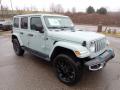 Front 3/4 View of 2023 Jeep Wrangler Unlimited Sahara 4XE Hybrid #7