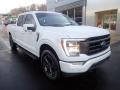 Front 3/4 View of 2022 Ford F150 Lariat SuperCrew 4x4 #9