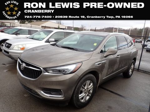 Champagne Gold Metallic Buick Enclave Essence AWD.  Click to enlarge.