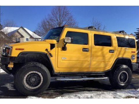Yellow Hummer H2 SUV.  Click to enlarge.