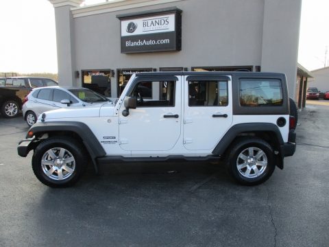 Bright White Jeep Wrangler Unlimited Sport RHD 4x4.  Click to enlarge.