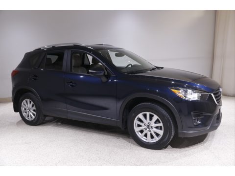 Deep Crystal Blue Mica Mazda CX-5 Touring AWD.  Click to enlarge.