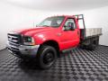 Front 3/4 View of 2002 Ford F450 Super Duty Regular Cab 4x4 Stake Truck #3