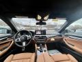 Front Seat of 2023 BMW 5 Series 540i xDrive Sedan #9