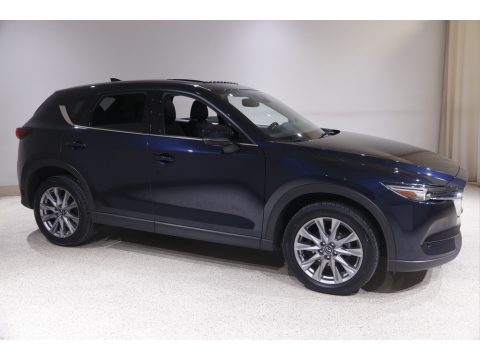 Deep Crystal Blue Mica Mazda CX-5 Grand Touring AWD. Click to enlarge. Deep Crystal Blue Mica Mazda CX-5 Grand Touring AWD. Click to enlarge.