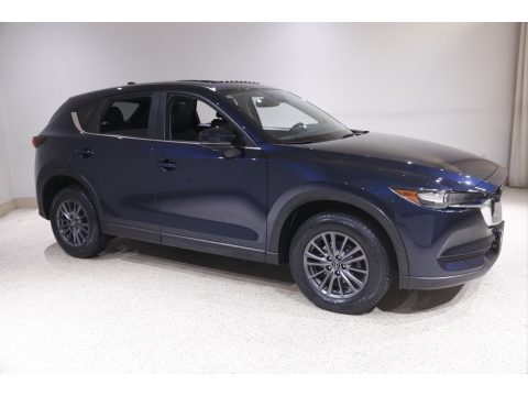 Deep Crystal Blue Mica Mazda CX-5 Touring AWD. Click to enlarge. Deep Crystal Blue Mica Mazda CX-5 Touring AWD. Click to enlarge.