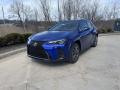 Front 3/4 View of 2023 Lexus UX 250h F Sport AWD #1