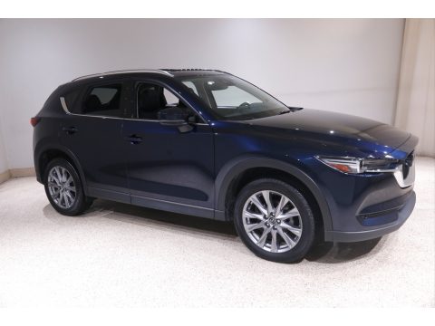 Deep Crystal Blue Mica Mazda CX-5 Grand Touring AWD. Click to enlarge. Deep Crystal Blue Mica Mazda CX-5 Grand Touring AWD. Click to enlarge.