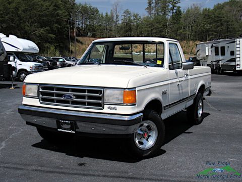 Colonial White Ford F150 XLT Lariat Regular Cab 4x4.  Click to enlarge.