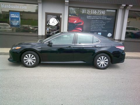 Midnight Black Metallic Toyota Camry Hybrid LE.  Click to enlarge.