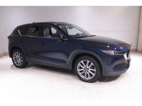 Deep Crystal Blue Mica Mazda CX-5 Grand Touring AWD. Click to enlarge. Deep Crystal Blue Mica Mazda CX-5 Grand Touring AWD. Click to enlarge.