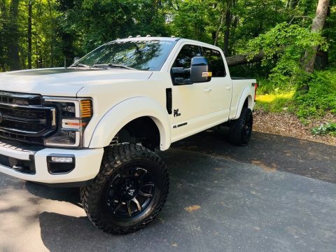 Star White Ford F250 Super Duty Lariat Crew Cab 4x4.  Click to enlarge.