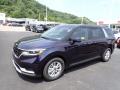 Front 3/4 View of 2024 Kia Carnival LX #4