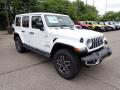 Front 3/4 View of 2024 Jeep Wrangler 4-Door Sahara 4x4 #7