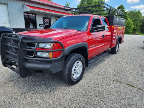 Victory Red Chevrolet Silverado 2500HD LS Extended Cab Utility.  Click to enlarge.