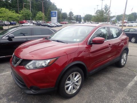 Scarlet Ember Tintcoat Nissan Rogue Sport SV AWD.  Click to enlarge.