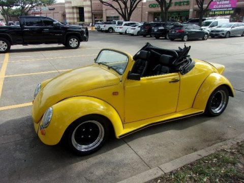 Yellow Volkswagen Beetle Convertible.  Click to enlarge.