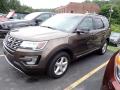Front 3/4 View of 2016 Ford Explorer XLT #1