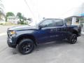 Front 3/4 View of 2023 Chevrolet Silverado 1500 Custom Trail Boss Crew Cab 4x4 #13