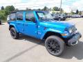 Front 3/4 View of 2024 Jeep Wrangler 4-Door Sahara 4xe Hybrid #7