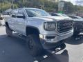 Front 3/4 View of 2018 GMC Sierra 1500 SLE Crew Cab 4WD #4