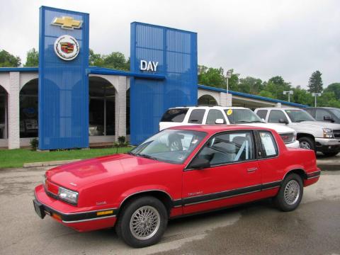 Bright Red Oldsmobile Cutlass Calais S Coupe.  Click to enlarge.