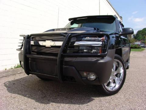 Black Chevrolet Avalanche 1500 4x4.  Click to enlarge.