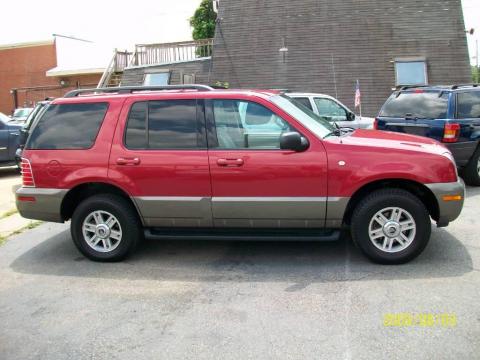Vivid Red Metallic Mercury Mountaineer Convenience AWD.  Click to enlarge.