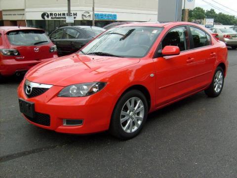 True Red Mazda MAZDA3 i Sport Sedan.  Click to enlarge.