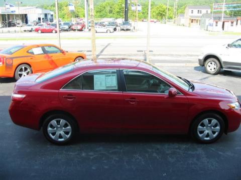Barcelona Red Metallic Toyota Camry LE.  Click to enlarge.