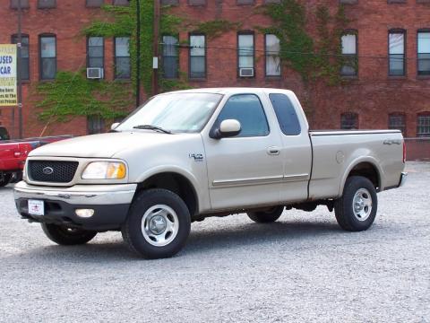 Harvest Gold Metallic Ford F150 XLT Extended Cab 4x4.  Click to enlarge.