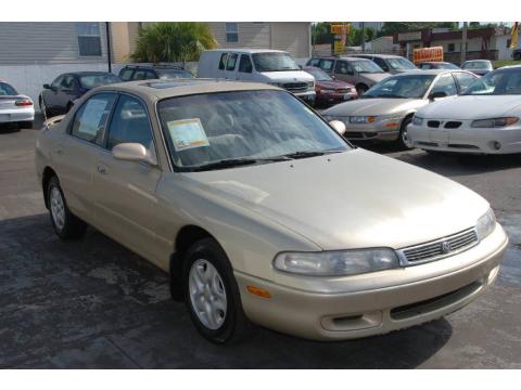 Sahara Gold Metallic Mazda 626 DX.  Click to enlarge.