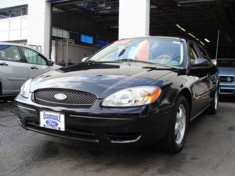 Black Ford Taurus SE Sedan. Click to enlarge. Black Ford Taurus SE Sedan. Click to enlarge.