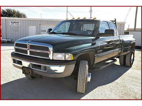 Forest Green Pearl Dodge Ram 3500 SLT Quad Cab 4x4 Dually.  Click to enlarge.