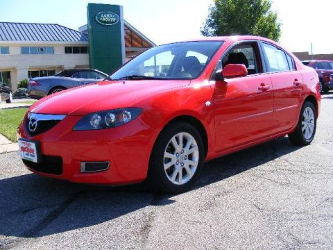 True Red Mazda MAZDA3 i Touring Sedan.  Click to enlarge.