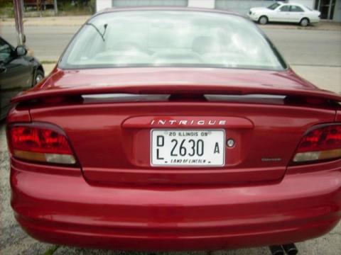 Crimson Red Metallic 1999 Oldsmobile Intrigue GL with Neutral interior 