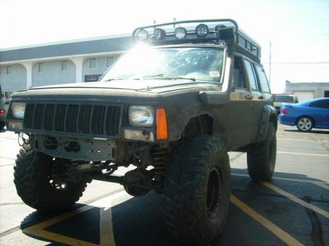 Green Jeep Cherokee Sport 4x4.  Click to enlarge.
