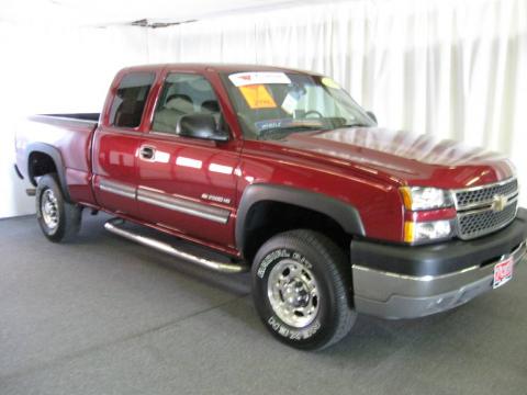Sport Red Metallic Chevrolet Silverado 2500HD LS Extended Cab 4x4.  Click to enlarge.