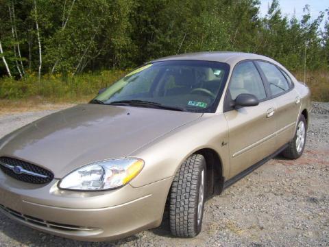 Harvest Gold Metallic Ford Taurus LX.  Click to enlarge.