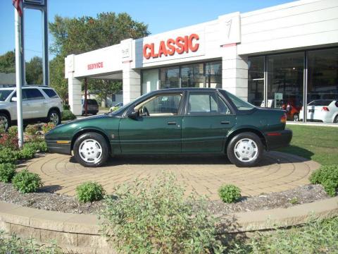 Green Metallic Saturn S Series SL1 Sedan.  Click to enlarge.